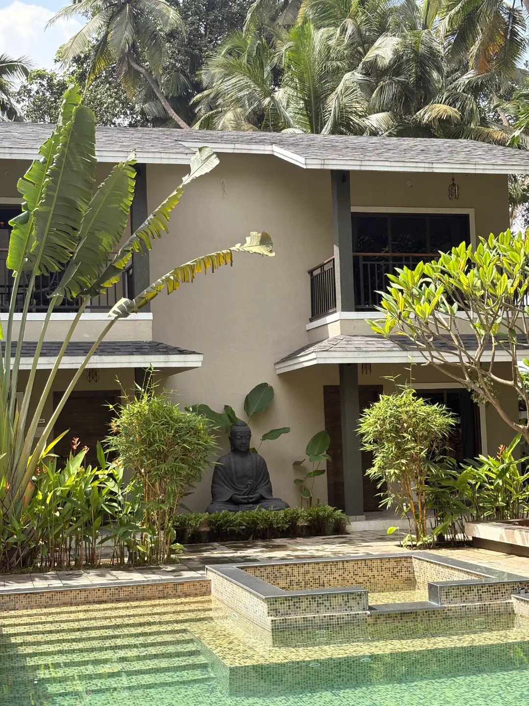 Resort building and tropical garden at The Coastal Heritage, Revdanda