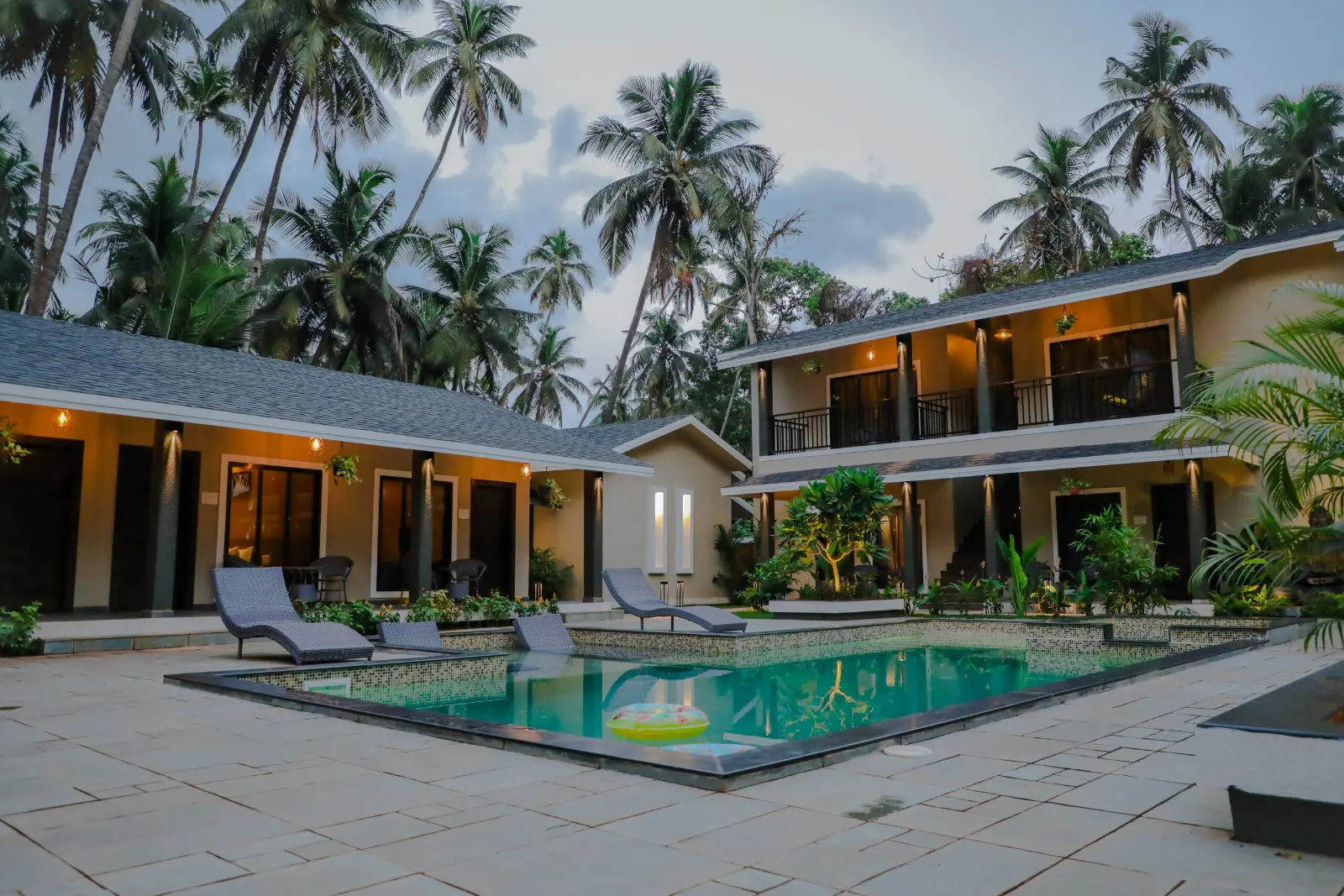 Poolside at twilight at The Coastal Heritage, Revdanda